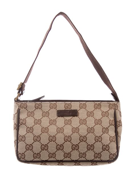 pochette gucci attacco jeans|gucci canvas handbags.